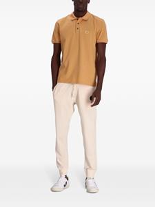 c.p.company C.P. Company Katoenen poloshirt met logo-applicatie - Oranje