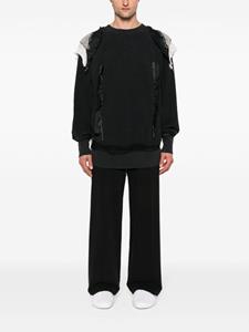 maisonmargiela Maison Margiela Badstof sweater met patchwork - Zwart