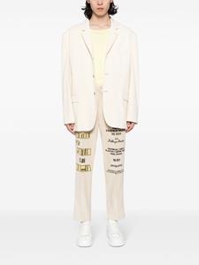 KidSuper Ribfluwelen broek met geborduurd patroon - Beige