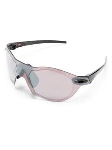 Oakley OO9098 zonnebril met rond montuur - Paars
