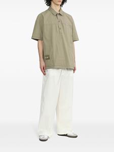 izzue Ruimvallende broek met logo-applicatie - Wit