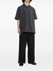 izzue Ruimvallende broek met logo-applicatie - Zwart