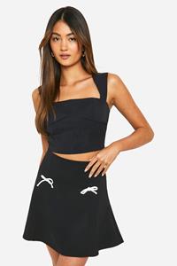 Boohoo Contrasterend Wijd Uitlopende Mini Rokje Met Strik, Black