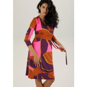 Aniston SELECTED Jerseyjurk met verleidelijk decolleté en trendy print