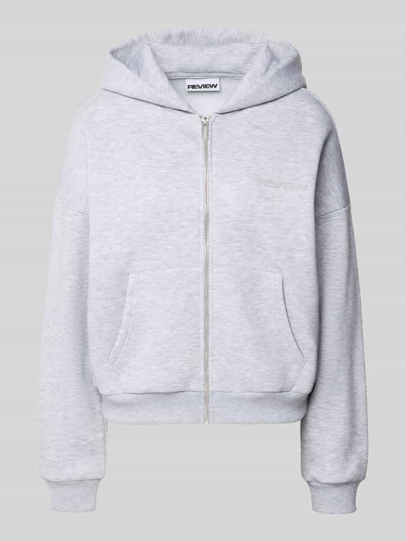 Review Oversized sweatjack met capuchon