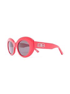Balenciaga Eyewear Zonnebril met oversized rond montuur - Rood
