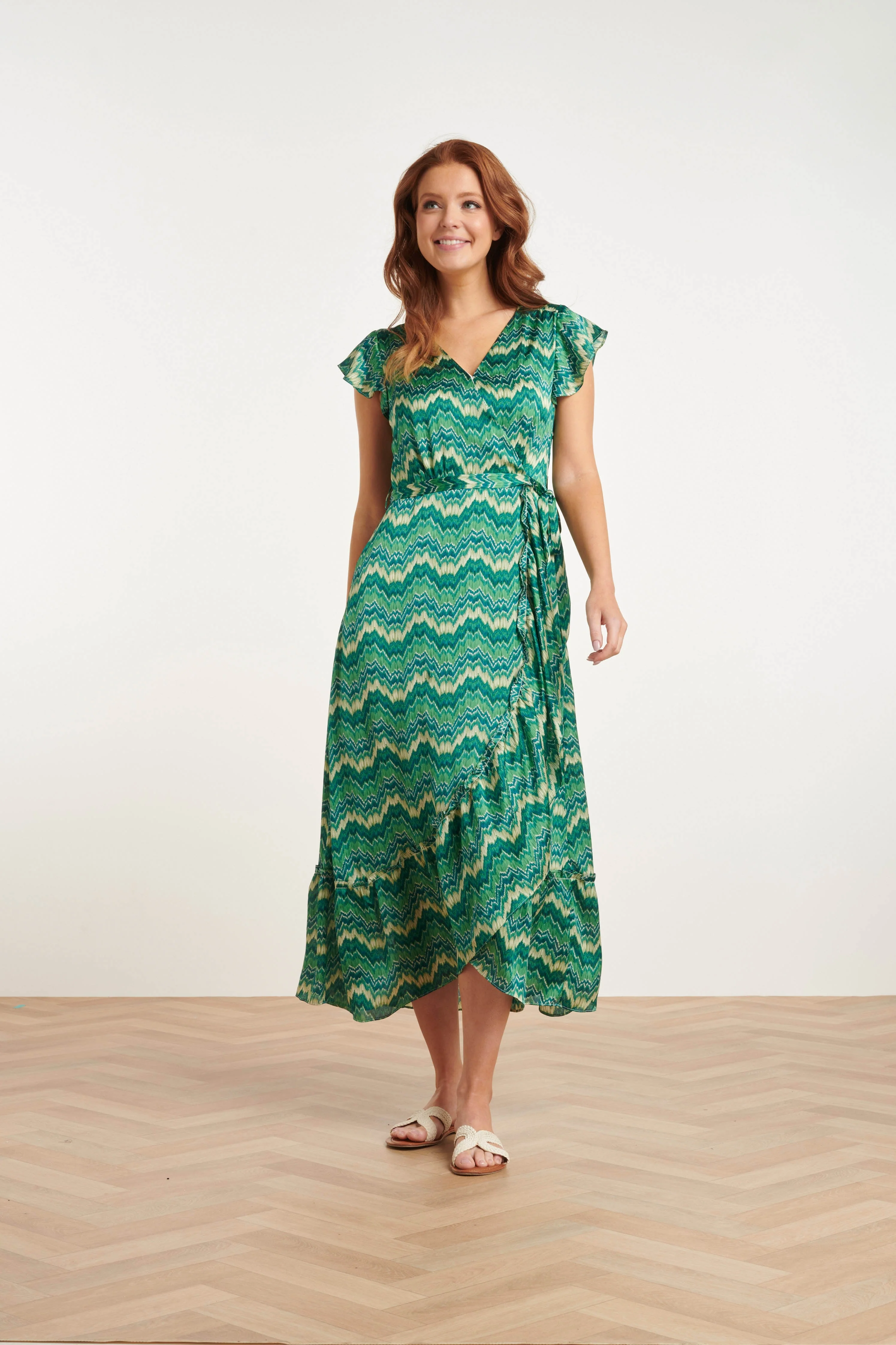 Smashed Lemon 24402 groene satijnen zomerjurk met abstracte print