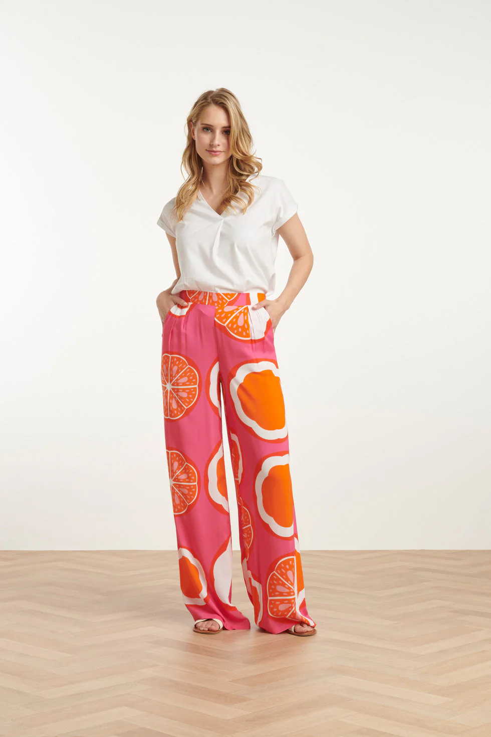 Smashed Lemon 25027 wide-leg broek met oranje fruitprint