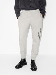 Alexander McQueen Trainingsbroek met graffiti-print - Grijs