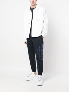 Alexander McQueen Trainingsbroek met graffiti-print - Blauw