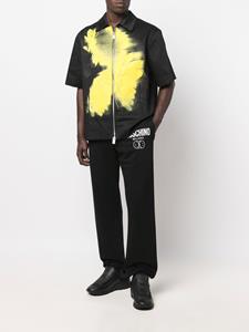 Moschino Shorts met print - Zwart