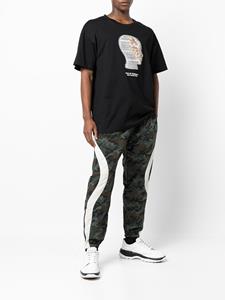 Mostly Heard Rarely Seen Trainingsbroek met camouflageprint - Groen