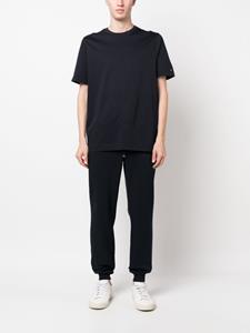 Tommy Hilfiger Trainingsbroek met geborduurd logo - Blauw