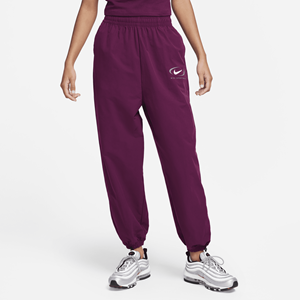 Nike Sportswear geweven joggingbroek voor dames - Rood