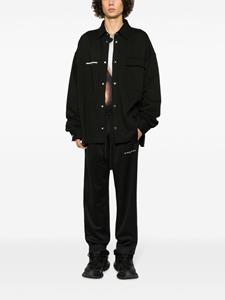 Ih Nom Uh Nit Broek met logoprint - Zwart