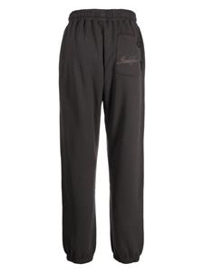 Izzue seam-detail tapered track pants - Grijs
