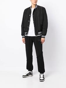 Represent Trainingsbroek met logoprint - Zwart