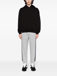 Neil Barrett Gestreepte low waist trainingsbroek - Grijs