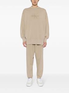 Calvin Klein logo-embroidered track pants - Beige