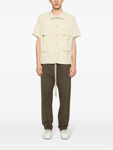 Fear Of God Forum mid waist trainingsbroek - Groen