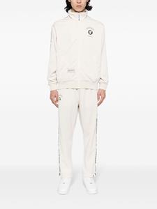 AAPE BY *A BATHING APE Trainingsbroek met geborduurd logo - Beige