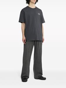 Izzue logo-embossed cotton track pants - Grijs