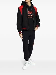 Alexander McQueen Graffiti cotton track pants - Zwart