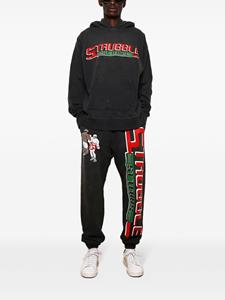 SAINT MXXXXXX logo-print cotton track pants - Zwart