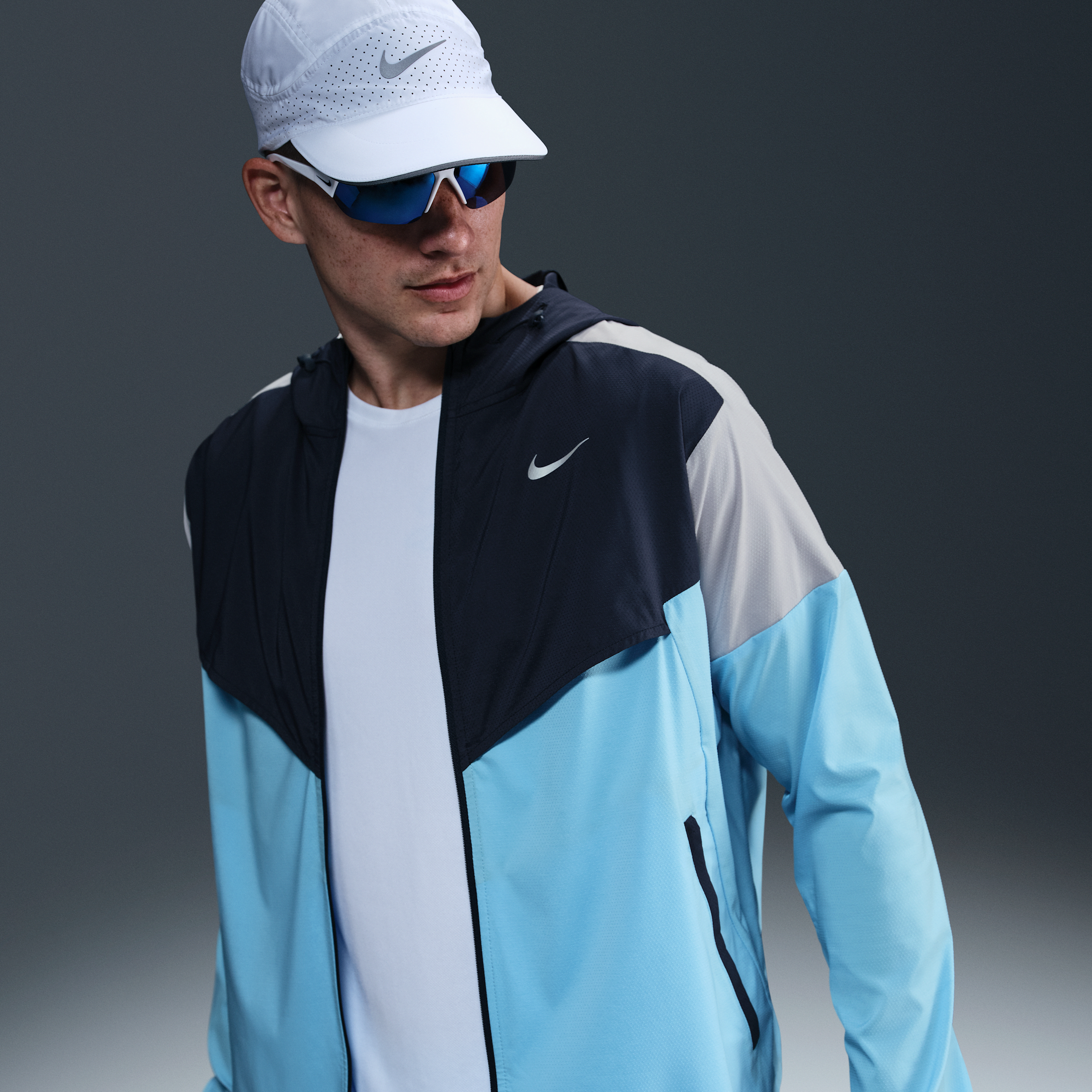Nike Impossibly Light Windrunner hardloopjack voor heren - Blauw
