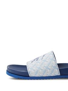 Burberry Slippers met monogramprint - Blauw