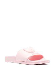 Moschino Slippers met logo-reliëf - Roze
