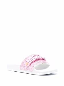 Moschino Slippers met logo-reliëf - Roze