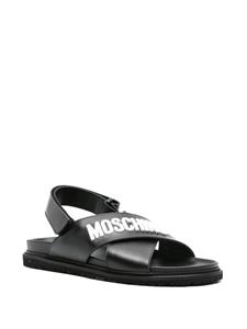 Moschino Leren sandalen met gekruiste band en logoplakkaat - Zwart