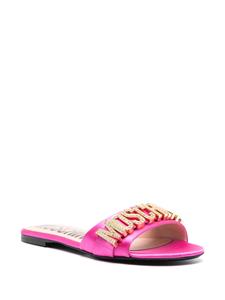 Moschino crystal-embellished logo-plaque sandals - Roze