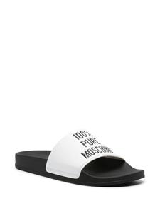 Moschino Slippers met logo-reliëf - Wit