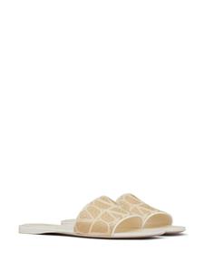 Valentino Garavani Slippers met monogram-print - Beige