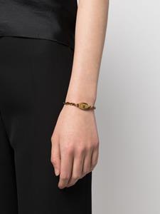 Alexander McQueen Schakelarmband met doodskop - Goud