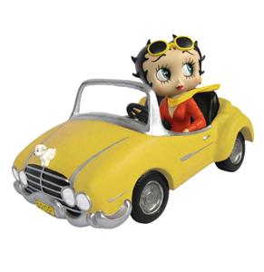 Fiftiesstore Betty Boop In Gele Sportauto Beeld