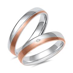 Unique Trouwringen in wit- en roségoud met diamant