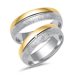 Unique Trouwringen in wit- en geelgoud met diamant