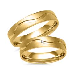 Unique Trouwringen in goud met diamant