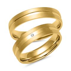 Unique Trouwringen in goud met diamant