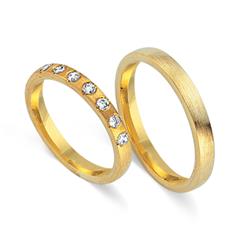 Unique Trouwringen 8 Karaat Geelgoud 7 Diamanten