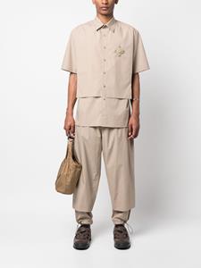 Craig Green Cropped pantalon - Beige