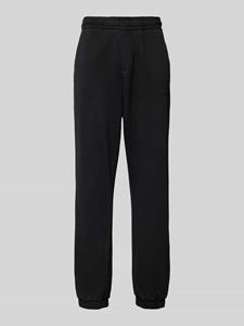 Adidas Training Tapered fit sweatpants met ritszakken