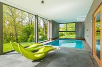 belvilla Moderne goed geïsoleerde villa met binnenzwembad midden in de natuur van Noiseux