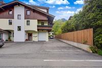 Belvilla Geweldig appartement in Kitzbühel met een tuin