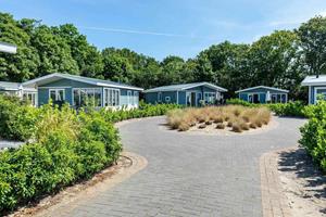 Heerlijkehuisjes.nl 5 persoons luxe chalet op vakantiepark Noordwijkse Duinen met zwembad en internet. - Nederland - Europa - Noordwijk