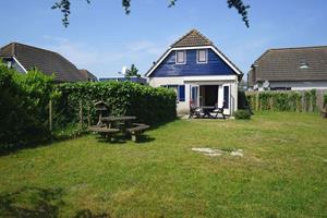 Heerlijkehuisjes.nl Gezellig 6-persoons vakantiehuis met grote, omheinde tuin en vlak bij de kust en Ouddorp - Nederland - Europa - Ouddorp
