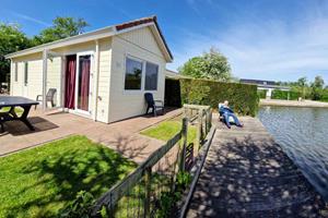 Heerlijkehuisjes.nl Mooi 3 persoons vakantiehuis aan viswater nabij Medemblik aan het IJsselmeer. - Nederland - Europa - Wervershoof